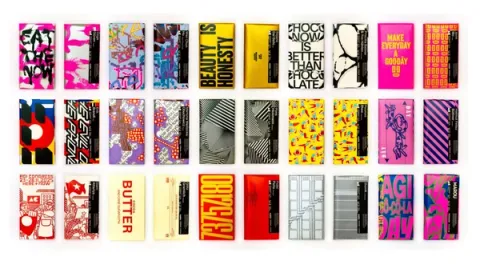 100 Top Designers Used Chocolate Bar Wrappers  as a Canvas for AGI Open 2025